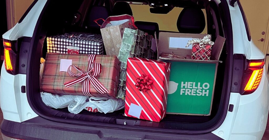 Wrapped gifts in the back of a car